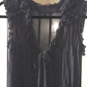 Adorable black sleeveless blouse